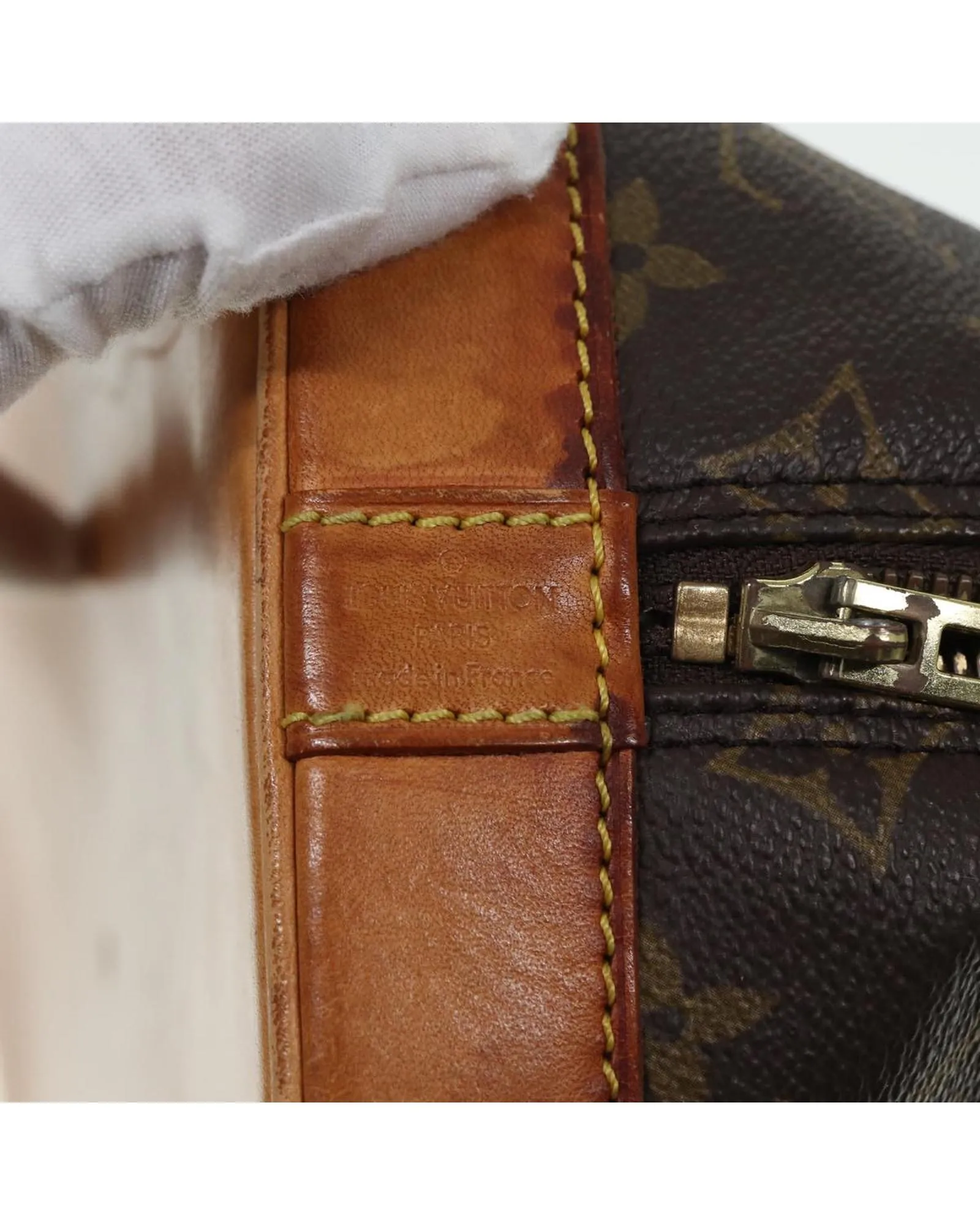 Monogram Canvas Alma Handbag with Classic Design